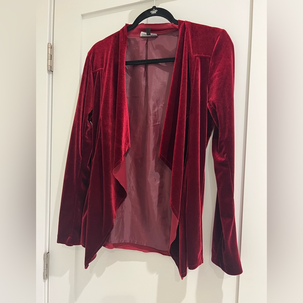 Like New Red velvet jacket, it’s slightly darker than the picture.